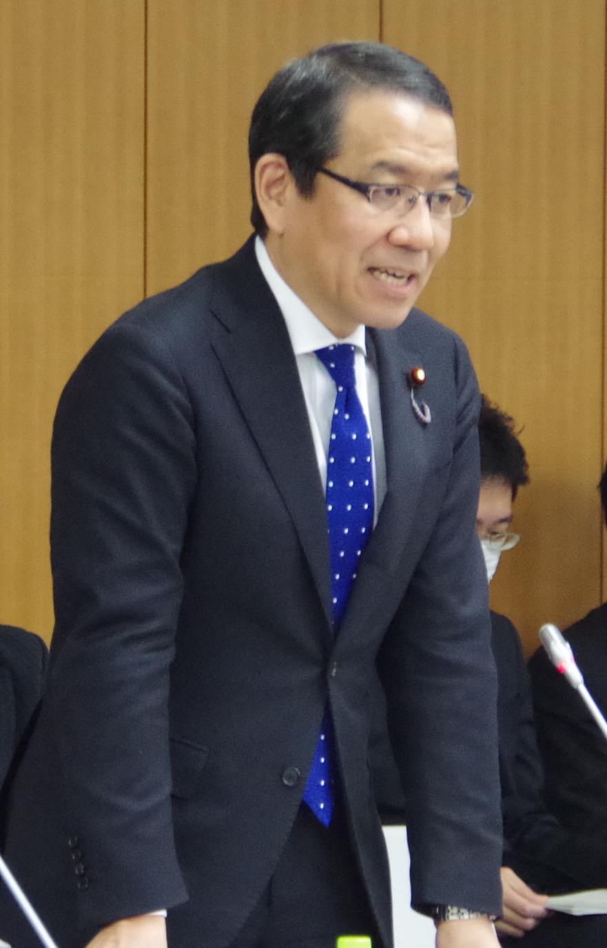 写真（3月3日 第38回金融審議会総会・第26回金融分科会合同会合にて挨拶する越智副大臣）